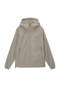 Veste à capuche beige clair avec fermeture éclair à l'avant, poignets élastiques et deux poches latérales zippées. Texture lisse, design décontracté.
