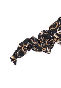 Sciarpa nera con motivi circolari astratti in beige e bianco, realizzata in tessuto soffice. Presenta un aspetto drappeggiato e testurizzato.