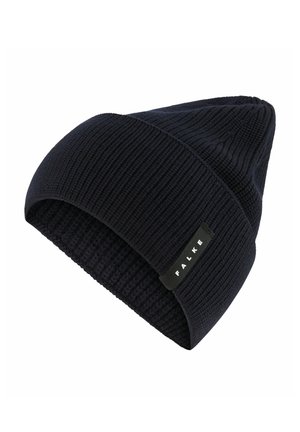 Black ribbed knit beanie with folded cuff and small rectangular FALKE brand tag on the side.