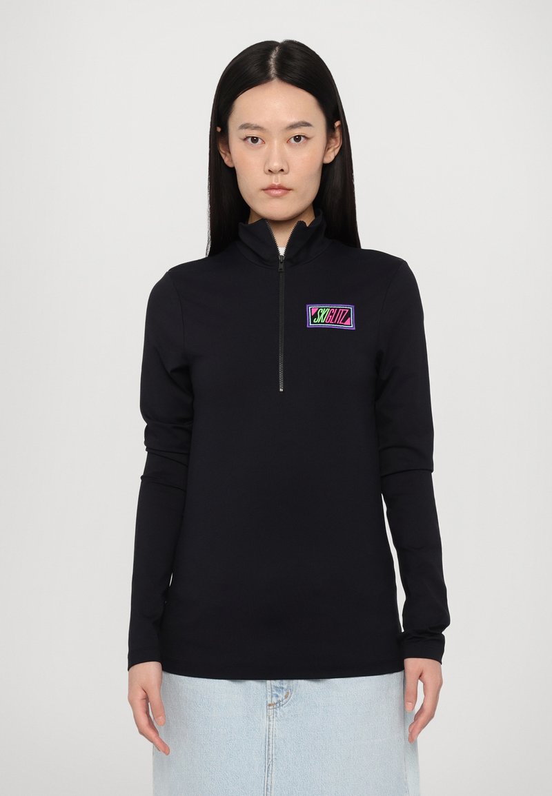 Black long-sleeve zip-up top with a fitted design. Features a colorful geometric logo on the chest and a smooth, stretchy fabric.