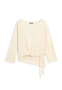 Pull crème à manches longues avec encolure bateau et détail de nœud sur le côté, avec un ourlet asymétrique.