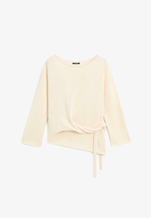 Krémový svetr s dlouhým rukávem, lodním výstřihem a detailem zavazování na straně, s asymetrickým zakončením.