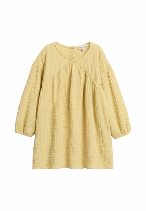 Luźna, żółta bluzka dla niemowląt z długim rękawem, okrągłym dekoltem, marszczoną fakturą tkaniny i ukośnym szwem na wysokości klatki piersiowej.