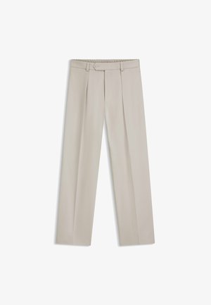 Light beige trousers with a wide-leg design, front pleats, and a flexible waistband. Made from smooth fabric, minimal hardware details.