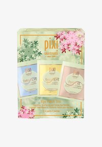 Pakke med tre øjenlappeposer: grøn til Detox, blå til BeautiEYE og pink til FortiEYE, med blomstrende accenter.