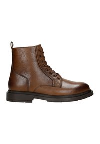 Bruine leren enkelboot met een ronde neus, gestructureerd oppervlak, vetersluiting en een stevige rubberen zool. Voorzien van een trekband aan de hiel.