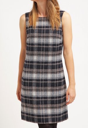 Vestido sin mangas con un patrón de cuadros en navy, gris y beige. Hecho de una tela texturada; hasta la rodilla y con corte recto.