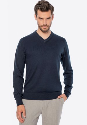 - Sweter
