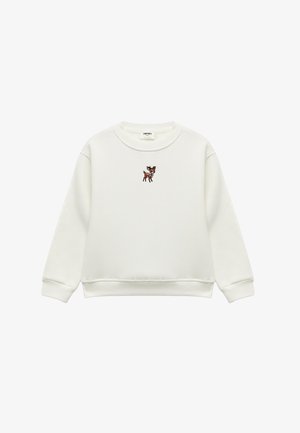Sudadera blanca de algodón con mangas largas y puños de canalé, que presenta un diseño de ciervo bordado en el pecho. Textura suave.