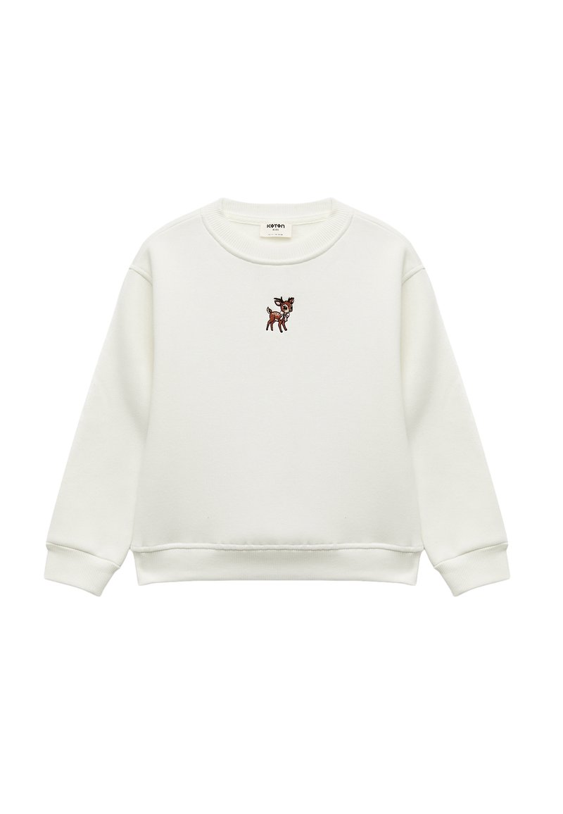 Vit bomullströja med långa ärmar och ribbade muddar, med en broderad rådjurdesign på bröstet. Slät textur.