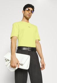 BOSS TCHUP - T-shirt básica - bright yellow