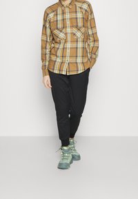 The North Face Träningsbyxor - black