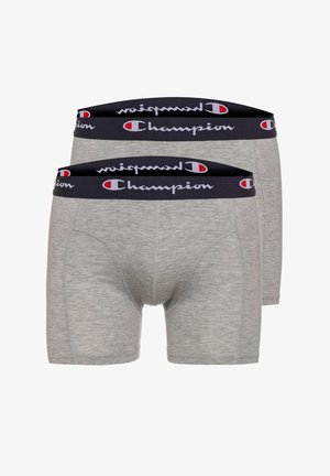 Two pairs of gray men's boxer briefs with black elastic waistbands featuring the Champion logo in white and red.