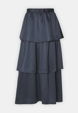 Jupe maxi bleu marine à volants en tissu lisse avec une taille élastique. Comprend trois couches fluides pour une silhouette structurée.