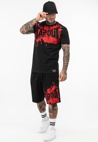 Tapout NORMALE PASSFORM BLASHED - Træningsbukser - black red
