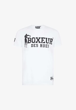 T-shirt bianco in cotone con stampa grafica nera e la scritta "BOXEUR DES RUES" oltre a una silhouette di un pugile sul davanti. Maniche corte.