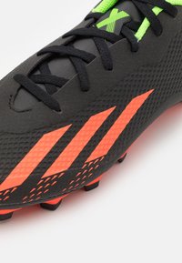 adidas Performance Jalkapallokengät kiinteälle alustalle - black