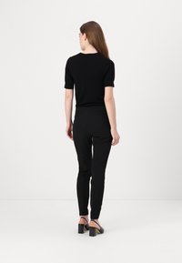 HUGO HAGONIA - Chino stiliaus kelnės - black