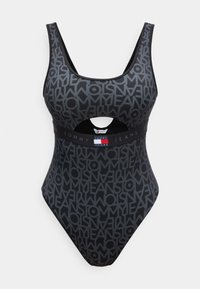 Ολόσωμο μαγιό σε σκούρο γκρι χρώμα με μαύρο μοτίβο λογότυπου "Tommy Jeans", λωρίδα με λογότυπο κάτω από το στήθος και μπροστινή κοπή κάτω από το στήθος.