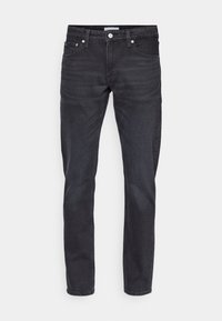 Svarta jeans i denim med slim fit, klassisk femficksdesign och metallknappsstängning. Slät textur med lätt blekning.