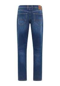 Tumedad denim teksad sirge säärega, millel on tagataskud dekoratiivse õmblusega ja väike pruun nahast silt vööl.