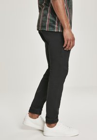 Southpole STRETCH JOGGER  - Treniņtērpa apakšdaļas - black
