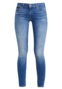 Jeans ajustados de denim en color azul, con un acabado desgastado, detalles rasgados, diseño clásico de cinco bolsillos y cremallera con cierre de botón.