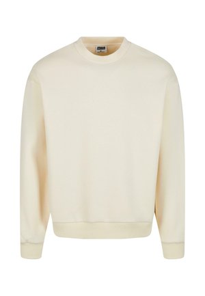 Világos krém színű crewneck pulóver, puha anyagból készült, bordás mandzsettákkal és szegéllyel, egyszerű, díszítések nélküli designnal.