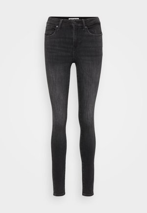 Sorte slim-fit denimjeans med mid-rise liv, fem lommer og lett falming for tekstur. Glatt, elastisk stoff for komfort.