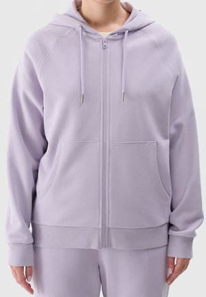Felpa zip-up di colore viola chiaro con cappuccio, tasche laterali, polsini e orlo a costine. Realizzata in tessuto morbido con una texture liscia.