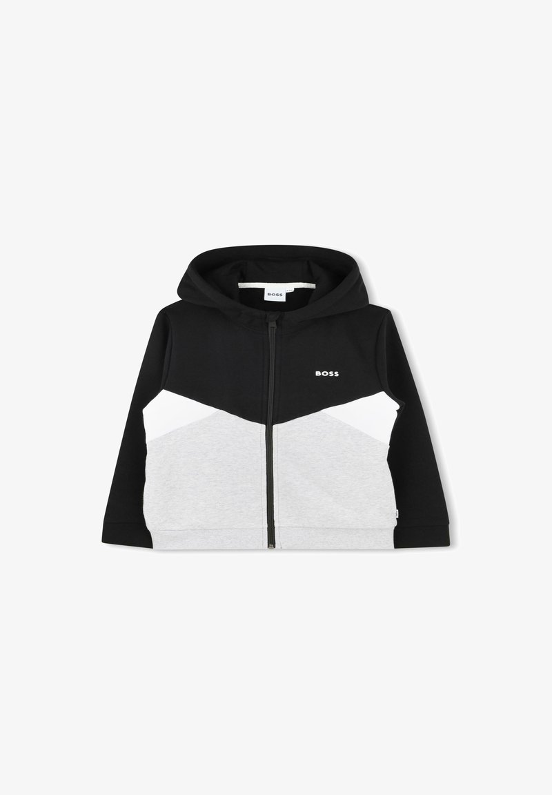 Sweatshirt à capuche zippé avec un design coloré en bloc noir, blanc et gris, offrant une texture douce et un détail de logo à l'avant.