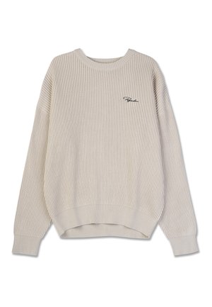 Beige ribbet striktrøje med rund halsudskæring og drop shoulder. Har et broderet logo på brystet. Bl�ød tekstur, afslappet pasform.