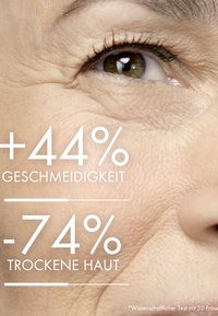 Close-up of skin showing fine lines and texture, with overlaid text indicating +44% smoothness and -74% dry skin. Light skin tone.