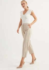 Chiquelle PENCIL - Tygbyxor - beige