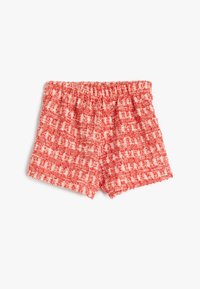 Pantalones cortos de tela de cuadros rojos y blancos con una cintura elástica. Material texturizado tejido, con un ajuste holgado y diseño casual.