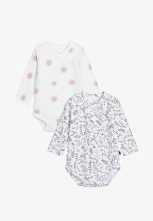 To lange langærmede babybodystockings: den ene hvid med ferskenfarvede soltryk, den anden grå med botaniske illustrationer, begge i blød bomuld.