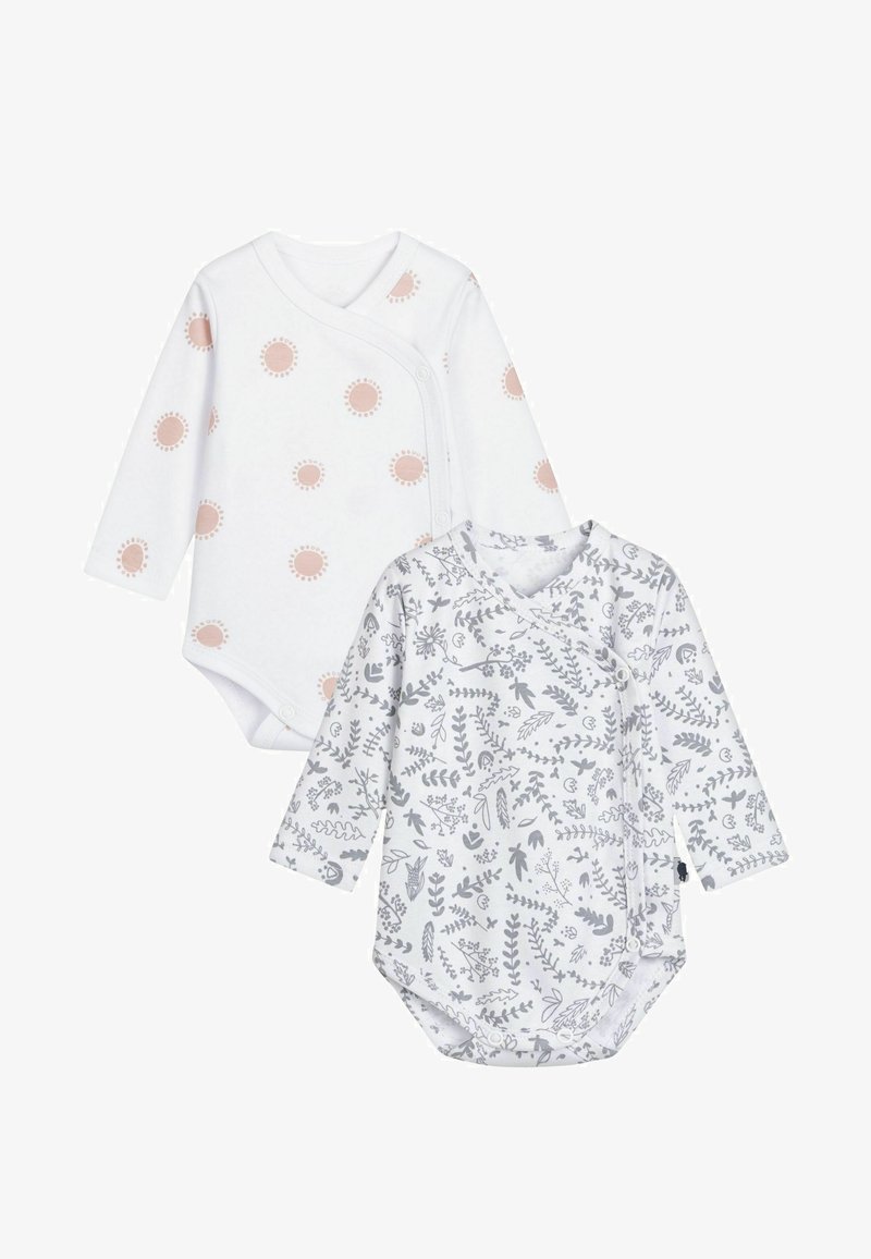 To lange langærmede babybodystockings: den ene hvid med ferskenfarvede soltryk, den anden grå med botaniske illustrationer, begge i blød bomuld.