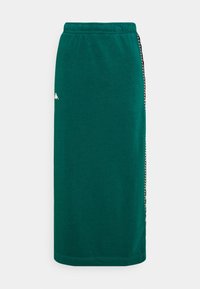 Merensinivihreä puuvillainen midihame, jossa on joustava vyötärönauha ja sivulla ketjutettu yksityiskohta. Sileä pinta, suora leikkaus ja hillitty logo edessä.