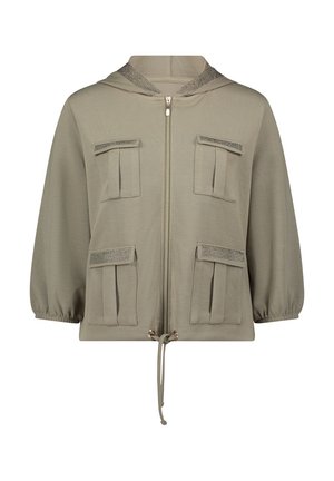 Beige hættetrøjejakke med lynlås foran, fire lommer med klapper og mesh-detaljer, trekvartærmer og justerbar snøre nederst.