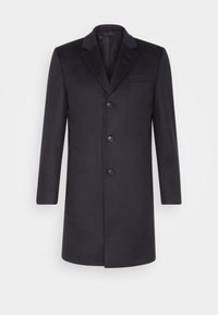 Cappotto in lana di un elegante blu scuro con una vestibilità su misura, rever a punta, tasca sul petto singola e chiusura a cinque bottoni. Tessuto liscio, design fino al ginocchio.