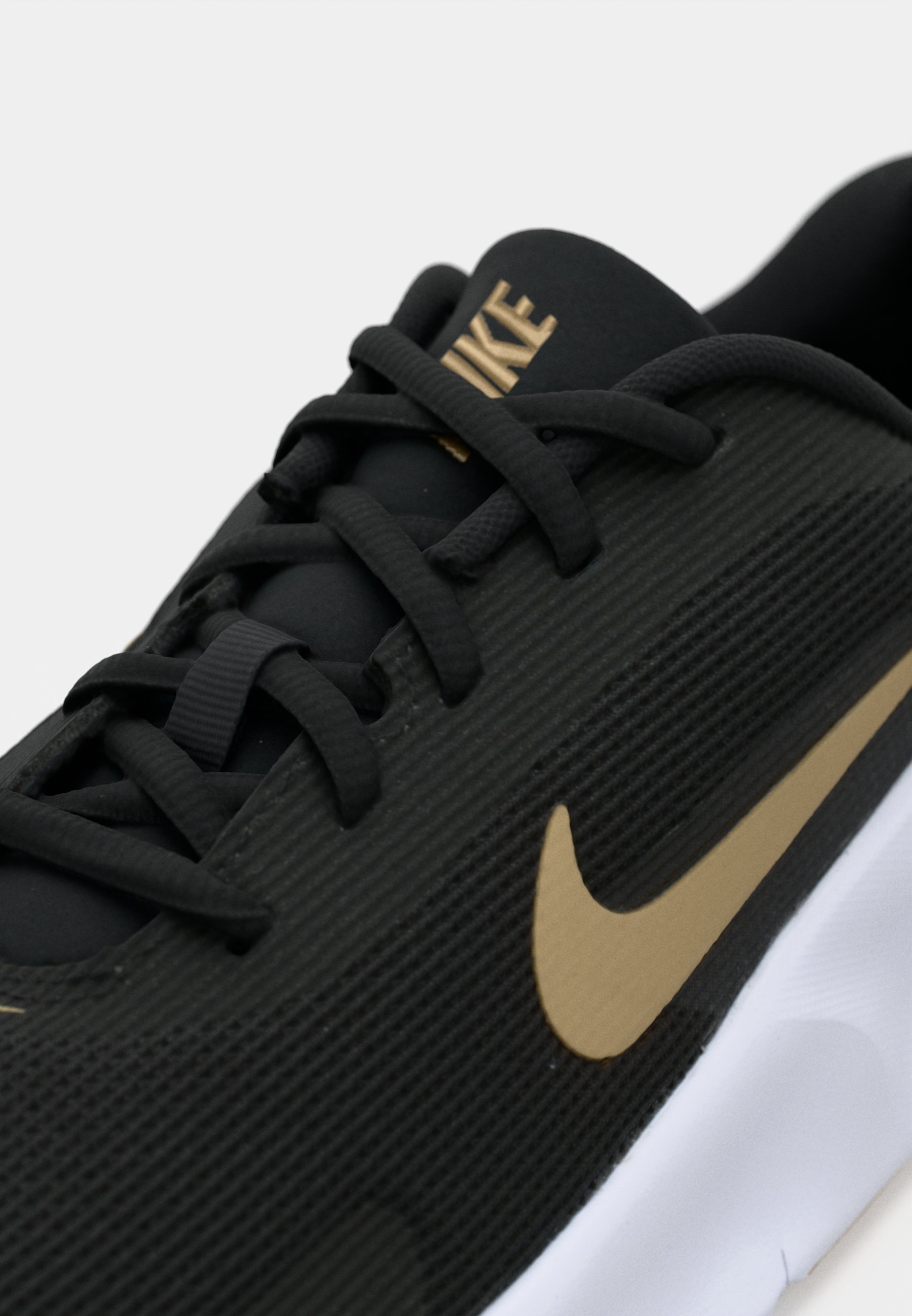 nike flex experience rn 7 black and gold