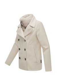 Veste crème à double boutonnage avec col à revers, ornée de boutons noirs, d'une doublure intérieure zippée et de poches latérales. Texture douce.
