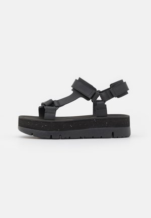 ORUGA UP - Korkeakorkoiset sandaalit - black