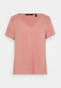 Krótki rękaw, różowy top z dekoltem w serek i marszczeniami na ramionach, wykonany z miękkiego, gładkiego materiału.