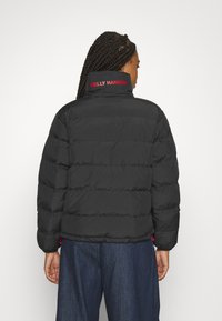 Helly Hansen REVERSIBLE PUFFER - Veste d'hiver - black