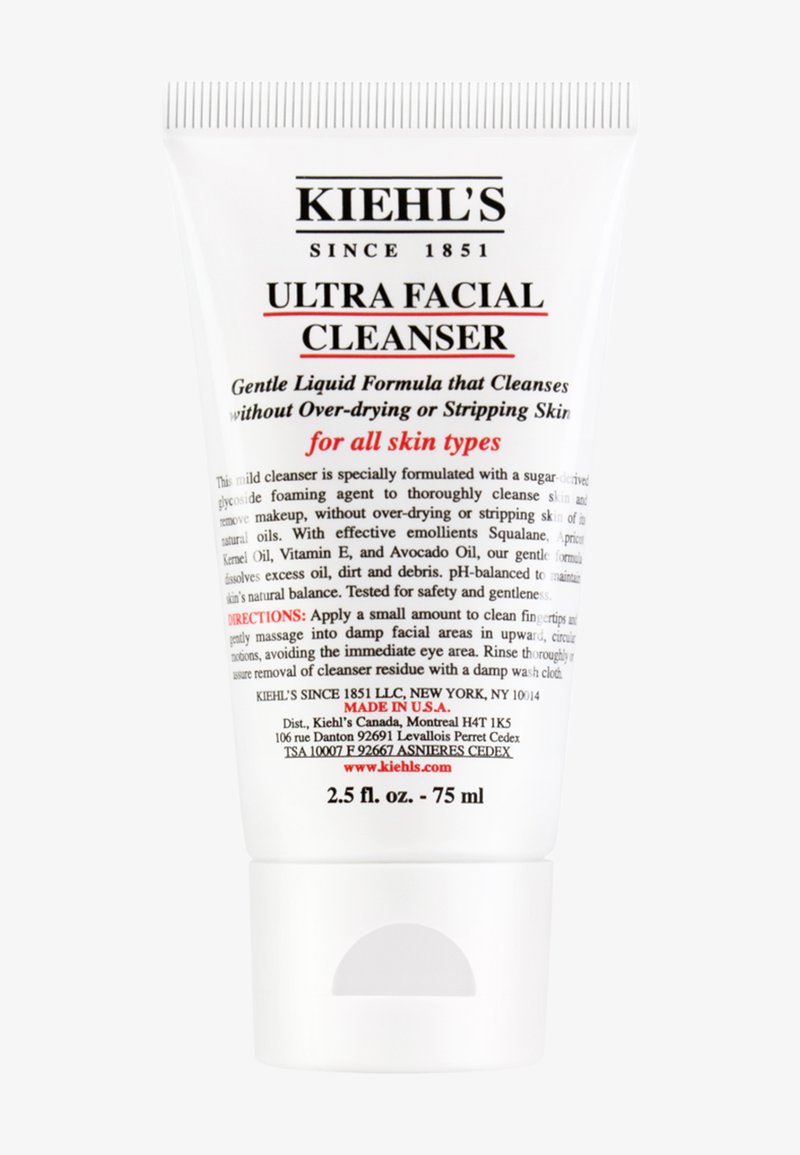 Kiehl's Ultra Facial Cleanser i en hvit tube med trykk; har rød og svart tekst. Inneholder 75 ml med flytende rensemiddel, egnet for alle hudtyper.