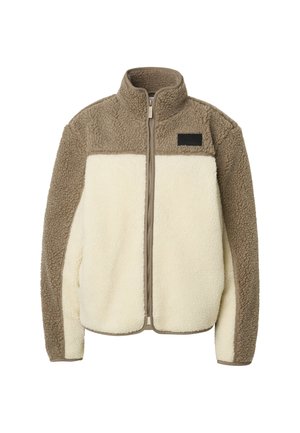 Bež in rjav flis pulover z zadrgo po celotni sprednji strani, visokim ovratnikom, dolgimi rokavi in majhno črno nalepko na zgornjem delu prsnega koša.