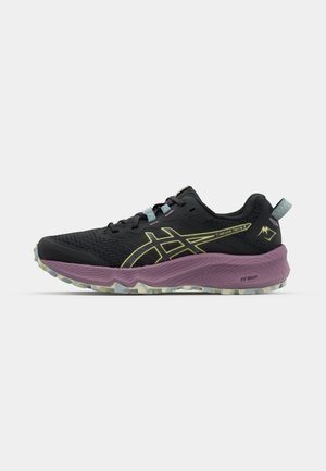 Zwarte sportieve schoenen met een bovenwerk van mesh, gele branding en een paarse tussenzool. Voorzien van een gestructureerde buitenzool voor grip en lichtblauwe veters.
