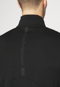 Peak Performance CHASE HALF ZIP SALUTE - Tops ar garām piedurknēm - black