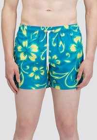 Blauwe zwemshorts met een gele bloemenpatroon, elastische tailleband, trekkoordsluiting en een gladde, lichte stof.